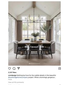 an image of a dining room table with chairs and a chandelier hanging from the ceiling