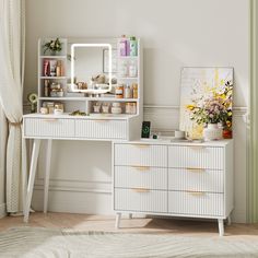 a white desk with drawers and a mirror