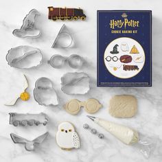 the harry potter cookie baking kit includes cookies, cutters, and other items to make it