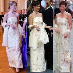 two women in white dresses standing next to each other and one wearing a tiara