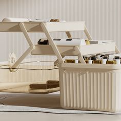 an old fashioned bath tub and shelf with various items in it on a white floor