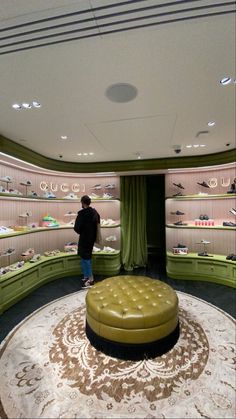 a man is looking at shoes in a shoe store