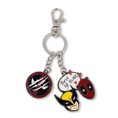 two key chains with cartoon characters attached to them, one is red and the other is black