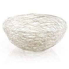 a white bowl sitting on top of a table