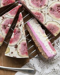 slices of cake with fruit toppings sitting on a cooling rack, ready to be eaten