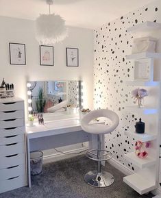 an instagram photo of a white bathroom with polka dots on the walls