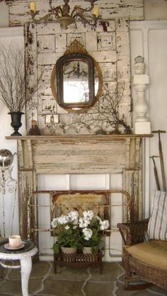 a living room filled with furniture and a fire place in front of a white brick wall