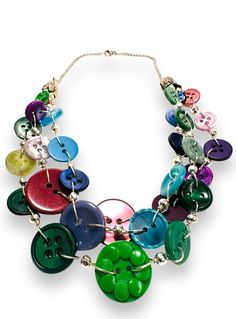 a multicolored necklace with buttons on it