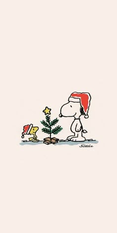 a charlie brown christmas card with a small tree in front of him and his dog