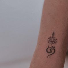 a person with a tattoo on their arm