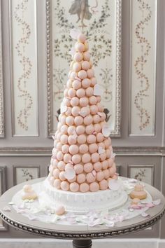 there is a cake made out of marshmallows on top of a table