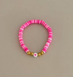 Bright pinkalicious love bracelet Trendy Pink Beaded Charm Bracelet, Trendy Pink Charm Bracelet With Letter Beads, Casual Heart Beads Bracelets For Valentine's Day, Pink Adjustable Charm Bracelet For Friendship, Cute Pink Bangle Charm Bracelet, Casual Pink Beaded Charm Bracelet, Adjustable Pink Charm Bracelet With Letter Beads, Casual Pink Stretch Bracelet With Round Beads, Casual Pink Personalized Beaded Bracelets