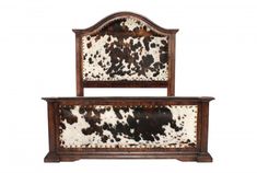 a cowhide headboard and foot board are shown