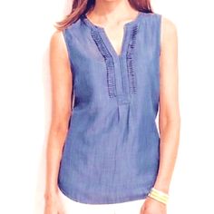 Rhythm And Blues! Talbots Denim Chambray Sleeveless Shirt With Ruffled, Scalloped V-Neck. Brand New! Stretch Sleeveless Medium Wash Denim Top, Casual V-neck Denim Vest, Blue V-neck Denim Vest Casual, Sleeveless Denim Top For Summer, Summer V-neck Denim Vest In Denim Blue, Cotton V-neck Denim Vest For Summer, Casual Dark Wash Denim Top With Ruffles, Casual Blue Ruffled Tank Top, Summer Blue Denim Vest With V-neck