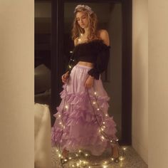 Style No. 79760716; Color Code: So Statement Making With A Charming Touch, This Skirt Is Sure To Stun For Every Occasion. Fit: High-Rise, Billowy A-Line Silhouette Features: Tiered Ruffle Detailing, Semi-Sheer Tulle Fabrication, Exaggerated Wide Waistband, Invisible Zip Closure Why We <3 It: An Effortless Touch Of Luxe To Any Look, Pair These With Sleek Heels Or Toughened Up Moto Boots For Endless Ways To Wear. Care/Import Machine Wash Cold Gentle Import Measurements For Size Small Waist: 29 In Feminine Ruffled Maxi Skirt For Party, Spring Ruffled Maxi Skirt For Night Out, Purple Bottoms For Winter Party, Purple Ruffled Skirt For Party, Purple Party Bottoms For Winter, Purple Winter Party Bottoms, Maxi Skirt Crop Top, Free People Maxi, Tulle Maxi Skirt