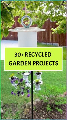 a sign that says 30 recycled garden projects in front of a yard with flowers on it