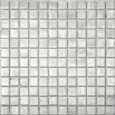 a white tile wall with square tiles on the bottom and one side in grey tones