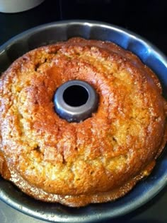 a bundt cake sitting on top of a metal pan