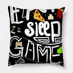 a black pillow with the words sleep game printed on it and various items surrounding it