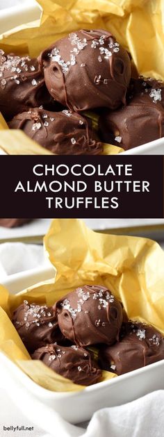 chocolate almond butter truffles in a white dish with yellow wrappers on top