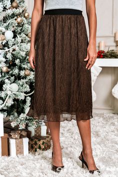 The Brown Pleated Midi Skirt adds a playful twist to your wardrobe with its flowing silhouette and stylish pleats. Perfect for dressing up or down, it effortlessly transitions from brunch to a night out. Product code: CAA02B4K041HJ Features:  Woven Midi Wash Method: Regular Wash Lining: 100%POLYESTER Material: 70%POLYESTER,30%SPANDEX. Make Memories, Pleated Midi Skirt, Polyester Material, Midi Skirt, Cardigans, Night Out, Women's Clothing, Dress Up, Twist