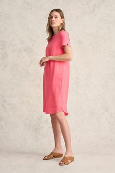 Perfect for transeasonal weather, this 100% French linen shift dress features a relaxed fit through the body with trendy side pockets and a curved hem. Available in Coral with a scoop neck, this flattering and comfortable style can be paired back with a white sneaker for a classic casual look. Linen Shift Dress, Short Women, Comfortable Style, Scarf Poncho, Classic Casual, Linen Shop, French Linen, Dress For Short Women, Linen Dress