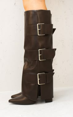 We are introducing the ultimate night out boot. Our newest arrival is our Classic Shark Fold Over Boot with a buckle strap design. Featuring a luxury faux leather material, just below knee high height and 4 inch heel - we are obsessed. Also available in: White,Black, Brown Perfect For: Holidays, Date nights, Day Drinks, nights out Size and Fit: True to size with 4" heel Brown Skirt And Boots Outfit, Brown Knee-high Heeled Boots, Trendy Brown Leather Knee-high Boots, Brown Leather Knee-high Boots, High Heel Leather Boots, Designer Brown Knee-high Boots, High Fashion Boots, Luxury Brown Leather Knee-high Boots, Belt Boots