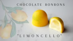 two lemons sitting next to each other on a white counter top with the words chocolate bonbons written below them