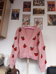 Design cardigan with pink and red rose motifs is carefully hand knitted. Rose Motif, Crop Cardigan, Motif Design, Pink And Red, Cropped Cardigan, Crochet Cardigan, Red Rose, Jumpers And Cardigans, Pink Red