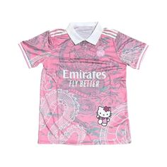 Show off your unique style and support your favorite team with the Custom Real Madrid Hello Kitty Jersey Tshirt. This piece perfectly blends the iconic Real Madrid branding with the adorable charm of Hello Kitty, creating a fun and stylish look that's perfect for fans of all ages. Crafted from high-quality fabric, this jersey T-shirt ensures you stay comfortable whether you're cheering on your team at the stadium or hanging out with friends. Specifications: Floral Pattern: Hello Kitty Sleeve Len Hello Kitty Outfits, Real Madrid Jersey, Madrid Jersey, Hello Kitty Dress, Pink Jersey, Jersey Tshirt, Summer Graphic Tee, Hello Kitty Items, Short Sleeve Pattern