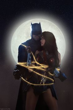 a man and woman dressed as batman and catwoman standing in front of a full moon