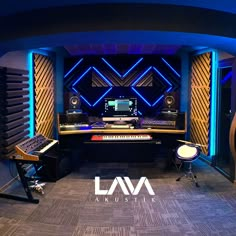 a recording studio with sound equipment and lights