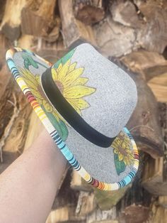 Handpainted sunflowers adding a unique accent to professionally beaded brim of a nice light Grey polyester fedora. A black ribbon adds a little bit of a color cut to this absolutely eye catching hat! Make it yours today or message me for a custom order! Beaded Fedora Hat, Beaded Hat Brim, Beaded Sunflower, Beaded Hats, Beaded Items, Hat Bands, Beaded Hat, Craft Corner, Black Ribbon