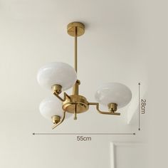 an image of a chandelier with three lights in the middle and measurements for it