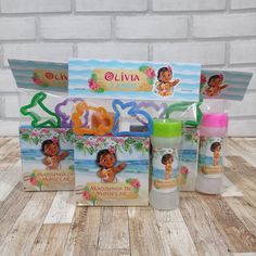 the children's gift set includes two bottles, an envelope and some other items