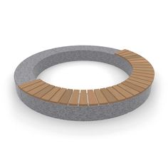 a circular bench made out of concrete and wood