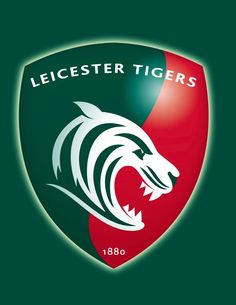 an image of the logo for the league team, le crescente tigers on red and green shield