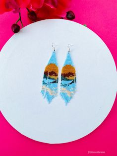 These beautiful beaded earrings are so colorful and perfect for all-day wear. They are definitely the perfect accessory to style up your look and add personality to your outfit. These lovely handmade earrings are made with sterling silver hooks and colorful beads. Each pair of earrings that we sell is authentic and one-of-a-kind! Finds more styles at https://www.etsy.com/shop/LatinxsCulturaViva?ref=simple-shop-header-name&listing_id=990207426&section_id=26730499 Thank you so much for vis Summer Gift Earrings With Dangling Beads, Summer Beaded Earrings With Round Beads For Pierced Ears, Summer Earrings With Tiny Beads As Gift, Summer Beaded Earrings, Huichol Earrings, Beautiful Beaded Earring, Mexican Earrings, Native American Earrings, Huichol Art