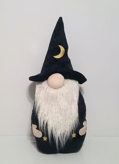 SOLD OUT AT POTTERY BARN Swap an everyday pillow for this wizard Gnome when Halloween starts. All the character of a garden gnome, with the so-soft velvet hand we like for sofa decor. Made of 100% Polyester velvet. Filled with 100% recycled polyester and plastic beads and sewn shut. Yarn-dyed fiber has incredibly rich color that holds its vibrancy over time. Spot clean fabric with a damp, white cloth. Blot to remove excess water. Air dry. Overall: 8" w x 23" h This item is posted and managed cou Gnome Wizard, Pottery Barn Halloween, Halloween Trends, Shaped Pillow, Halloween Jack O Lanterns, Garden Gnome, White Cloth, Garden Pillows, Halloween Jack