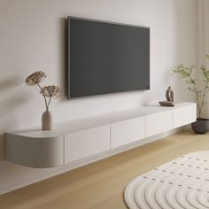 a large flat screen tv mounted to the side of a wall