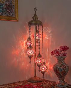 Style: Bohemian, Turkish Materials Used: Brass, Hand-blown glass, Colored Glass, Mirror Shards Color Variations: Red/Orange mosaic (main image) + 4 additional mosaic patterns Dimensions: Height: 51.2" / 130 cm Width: 10" / 26 cm Lightbulb Size: Compatible with E-12 (US) or E-14 (UK & EU) sockets. Lightbulbs not included. Voltage: Compatible with 110V and 220V. Durability: Brass is resistant to color changes and rust. Assembly Required: No Description: Elevate your living space with this exquisit Mirror Shards, Orange Mosaic, Bohemian Lamp, Turkish Lights, Turkish Mosaic Lamp, Turkish Mosaic, Ambience Lighting, Corner Lamp, Moroccan Lamp