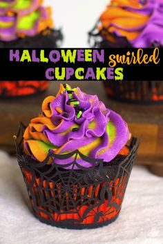 halloween cupcakes with purple frosting and sprinkles on the top