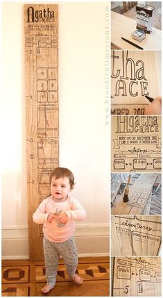 a baby standing in front of a wooden ruler with writing on it's side