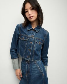 An elevated take on the classic trucker jacket. Made from premium Japanese denim, the Phila features a cropped, boxy fit and an extra-wide cuff. Wear it with anything and everything, but we especially love pairing this with the Patricia skirt for a chic take on double-denim.100% CottonUnlinedFabric country of origin: JapanTurn inside out and machine wash cold. Hang to dry.Style #J24111680092ED Double Denim, Blue Jean Jacket, Japanese Denim, Cropped Denim Jacket, Wide Cuff, Trucker Jacket, Veronica Beard, Cropped Denim, Jean Jacket