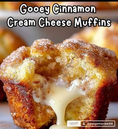 gooey cinnamon cream cheese muffins are being drizzled with icing