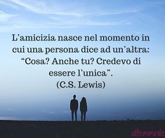 two people standing next to each other in front of a blue sky with the words c s lewis