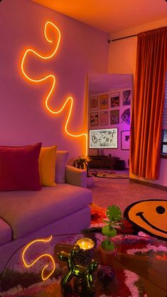 a living room filled with furniture and neon lights