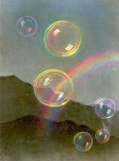 soap bubbles floating in the air over a mountain