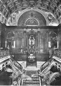 an old black and white photo of the inside of a building with ornate decorations on the ceiling