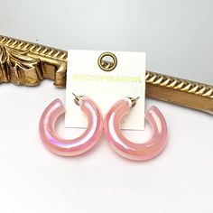 Pictured is a pair of chunky tube hoop earrings in iridescent pink. These earrings are pictured on a white background with a gold mirror behind them. Playful Pink Cheap Hoop Earrings, Luxury Small Pink Hoop Earrings, How To Make Pink, Iridescent Earrings, Jewelry Girl, Pink Chrome, Giddy Up Glamour, Chunky Hoop Earrings, Wow Factor